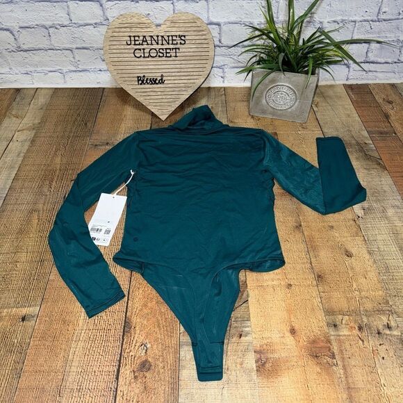 Lululemon Wundermost Ultra-Soft Nulu Turtleneck Bodysuit
Storm Teal - Picture 15 of 15
